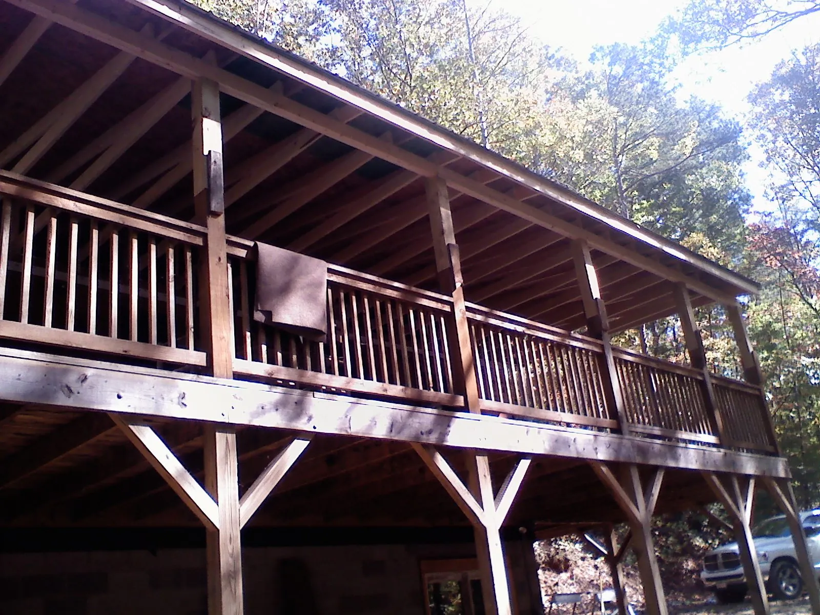 Timber framing under a new elevated porch and deck — Roof Leak Repair in Ellensburg by Roofing Brothers
